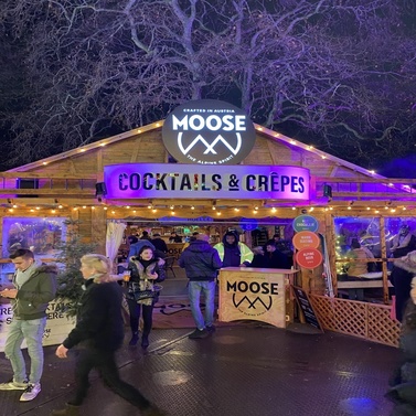 Exterior of a winter marquee in Hyde Park London at Winter Wonderland, being used as a bar for The Moose Drink