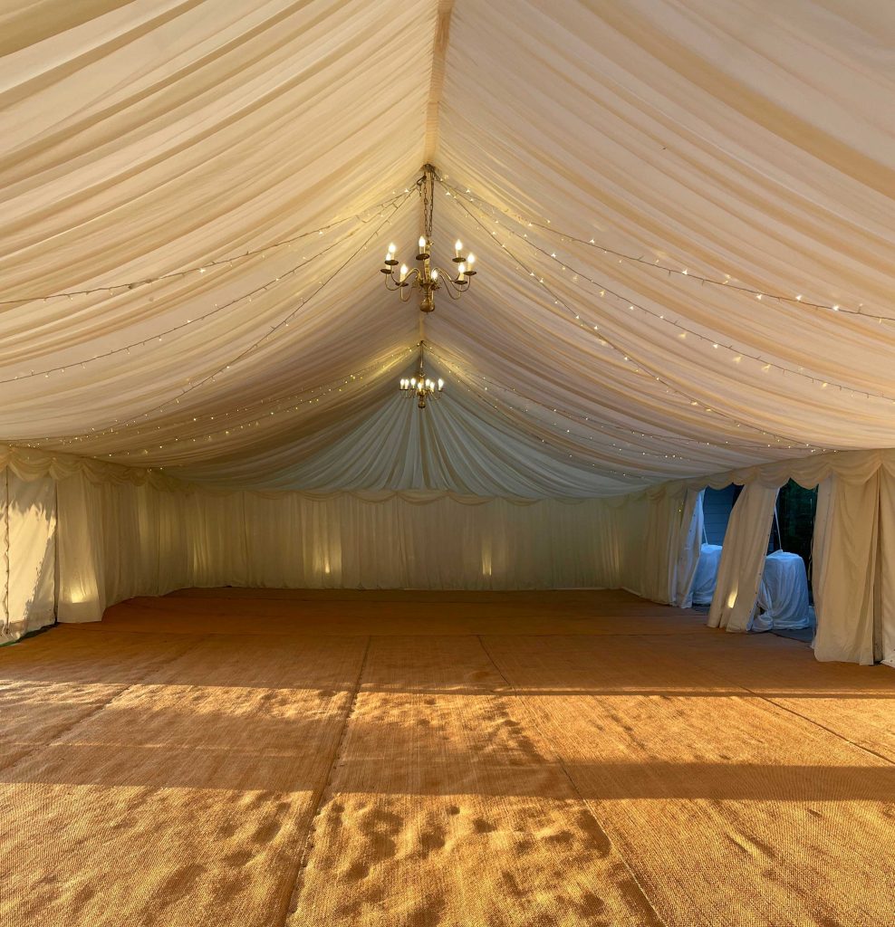 Marquee for a party, with chandeliers and LED lighting too.