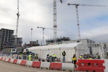 St William cranes Marquee hire London for a construction site, with cranes in the background