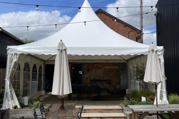 Witches hat marquee hire Hampshire. Marquee set up for a long term hire at Blackchalk Vineyard in Hampshire