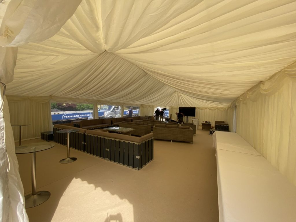 Internal view of a marquee being set up for a corporate event. Marquee hire in Berkshire